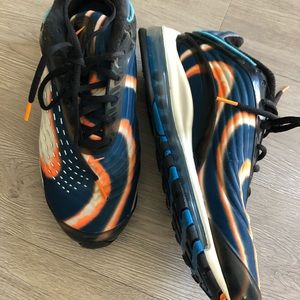 Nike sneakers worn only a couple of times. Orange and blue, great condition.